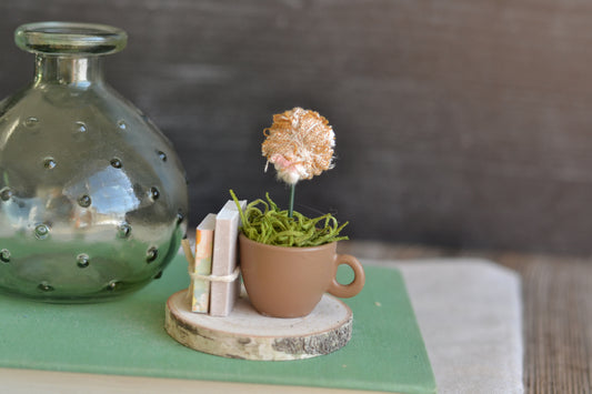 TAN Books and Flowers Sign