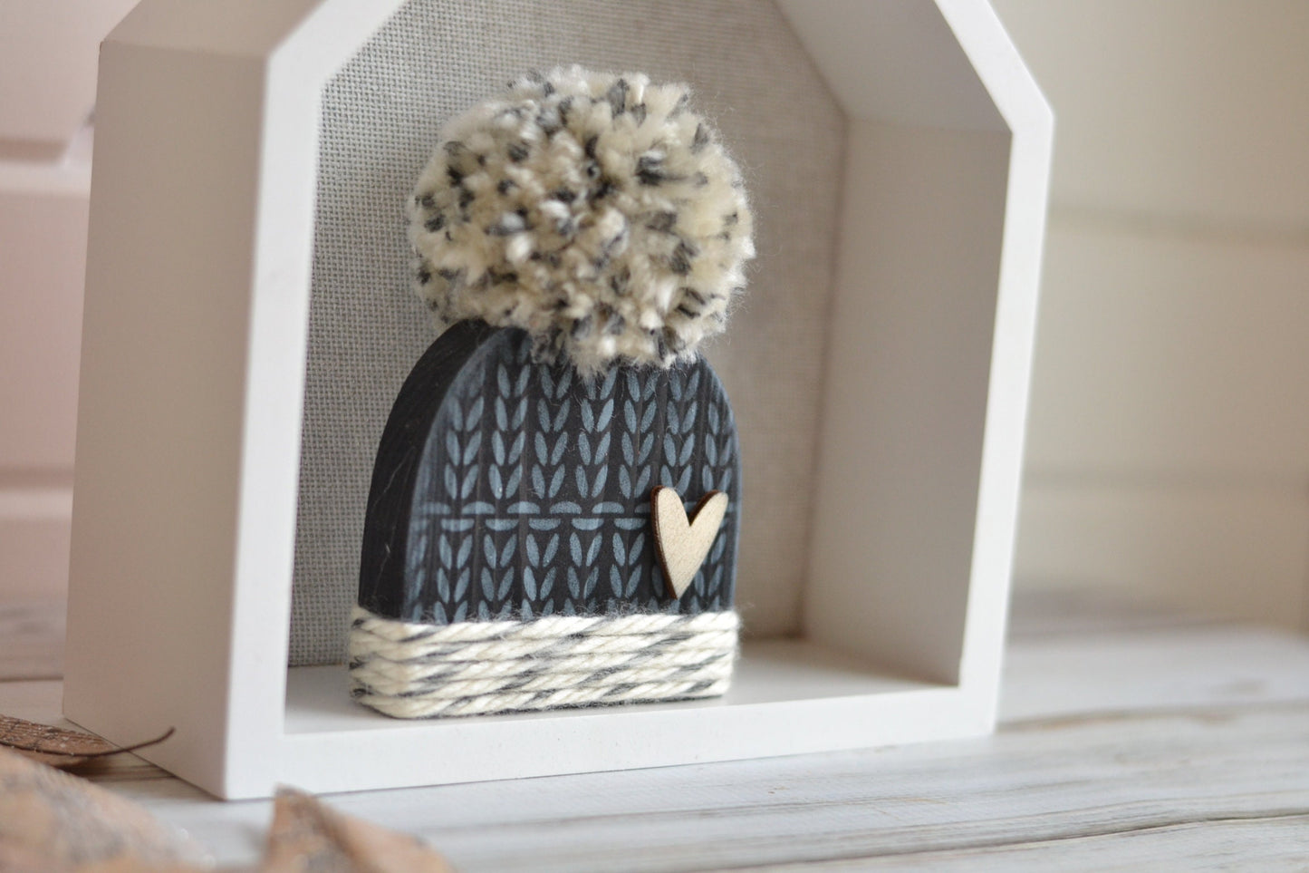 Black winter hat with pom.